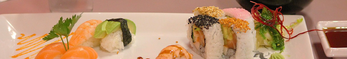 Eating Seafood at Sake2Me Sushi Rolls restaurant in Hays, KS.
